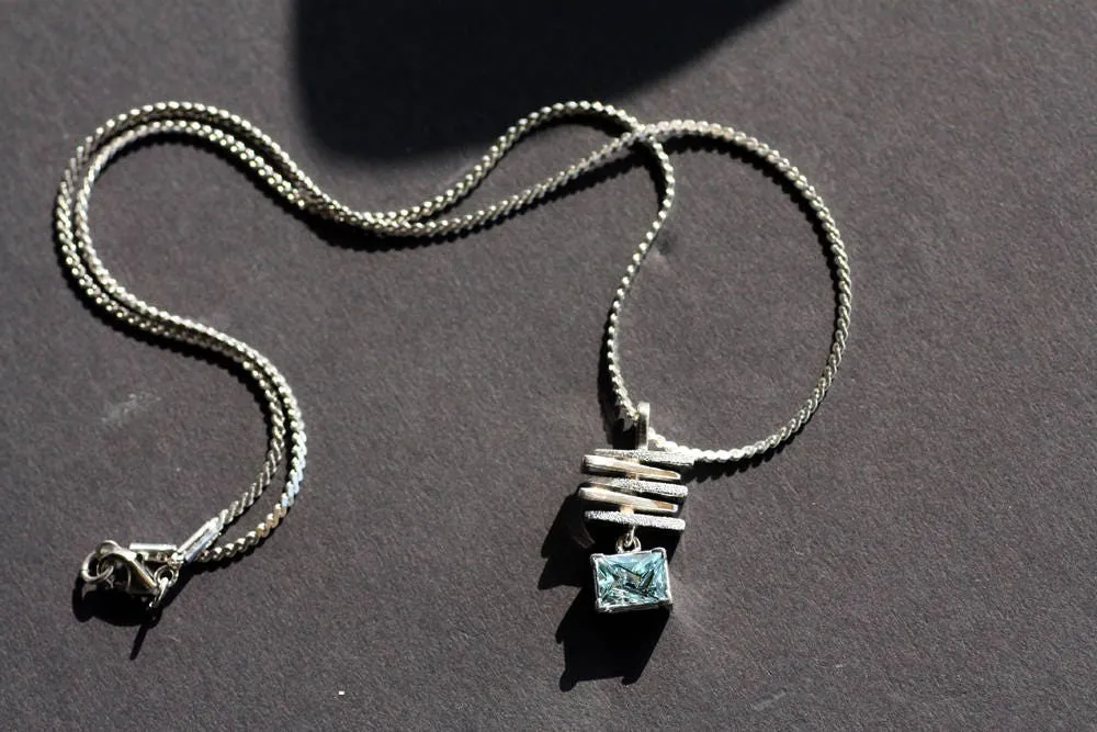Handcrafted aquamarine pendant