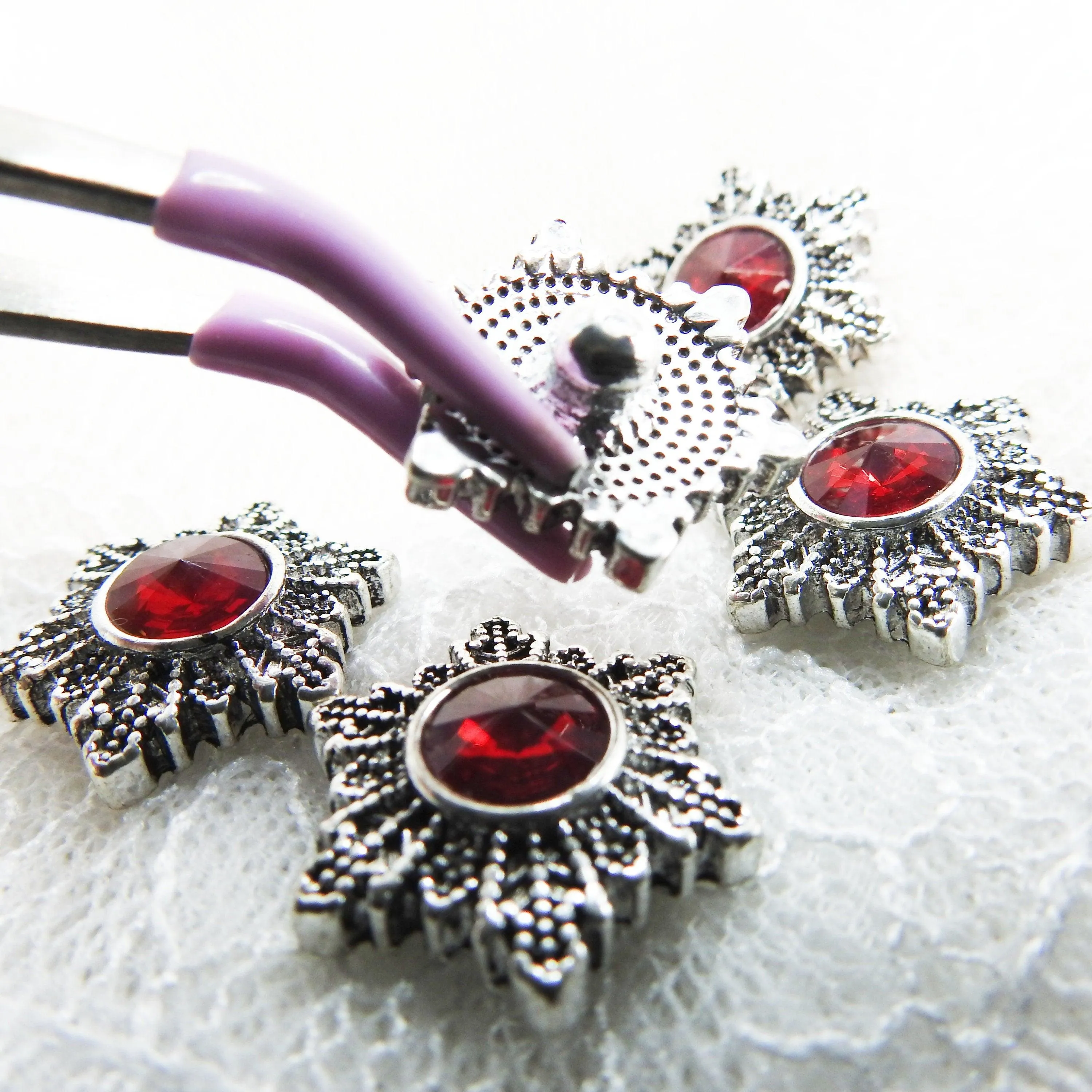 Red snowflake snap buttons