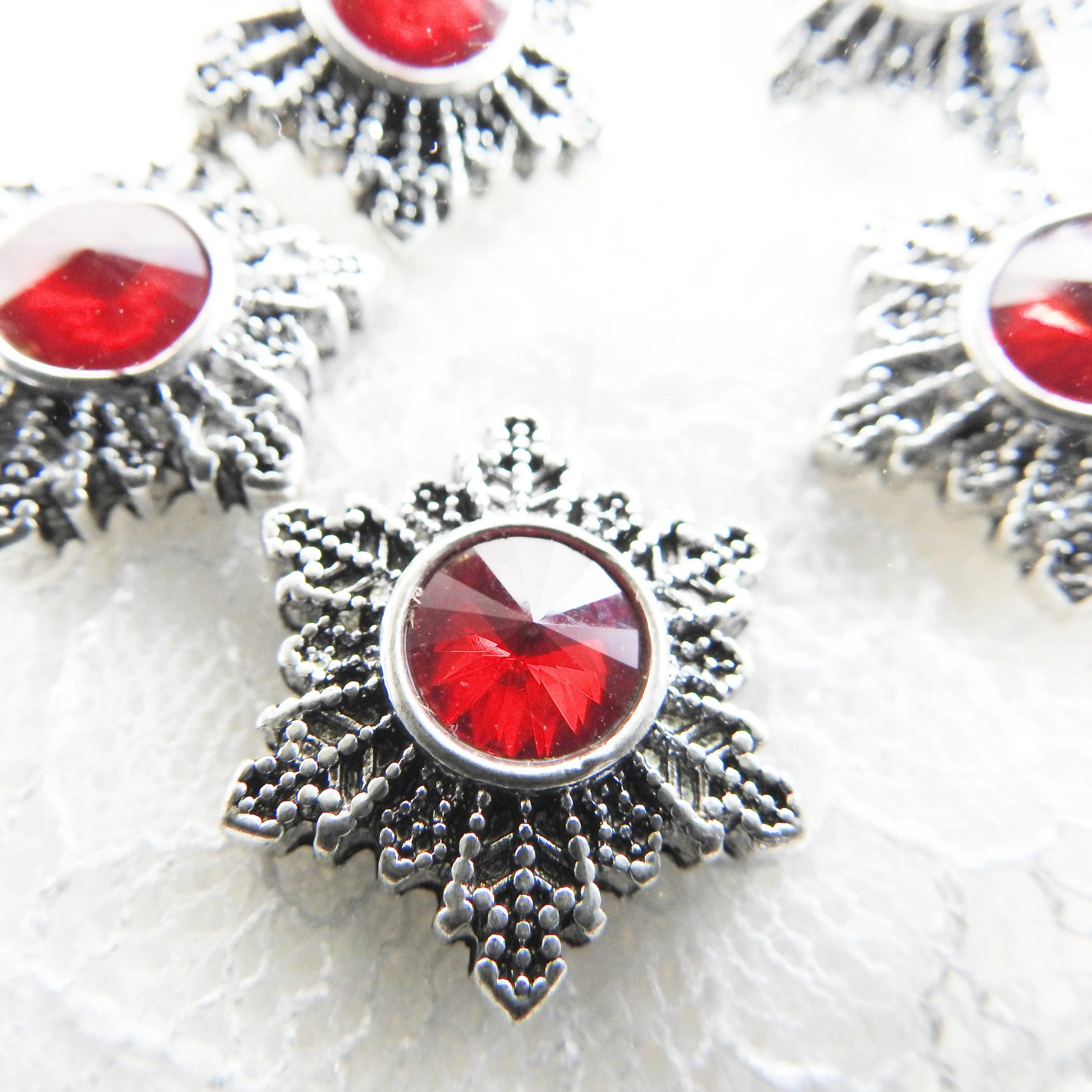 Red snowflake snap buttons