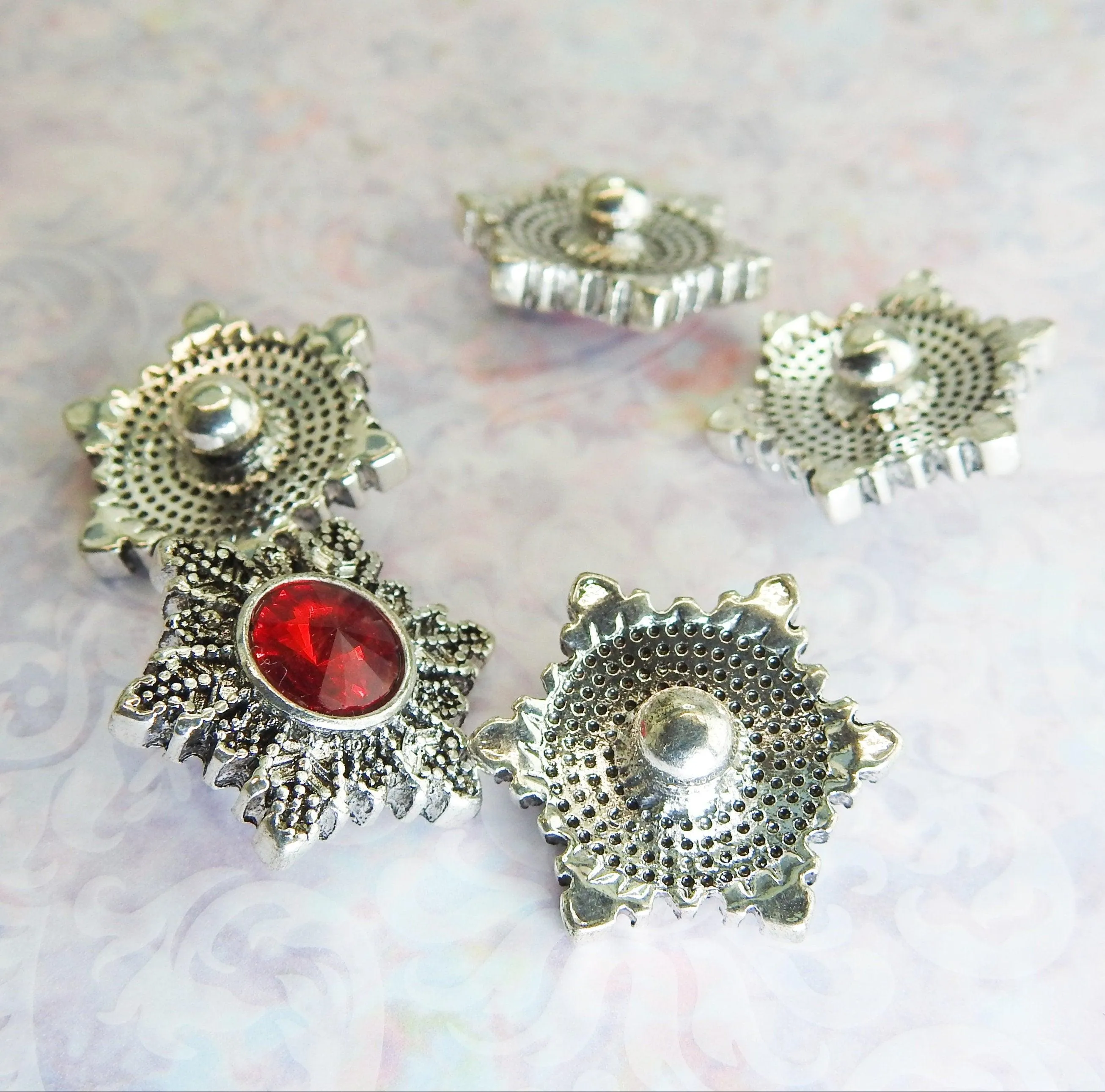 Red snowflake snap buttons
