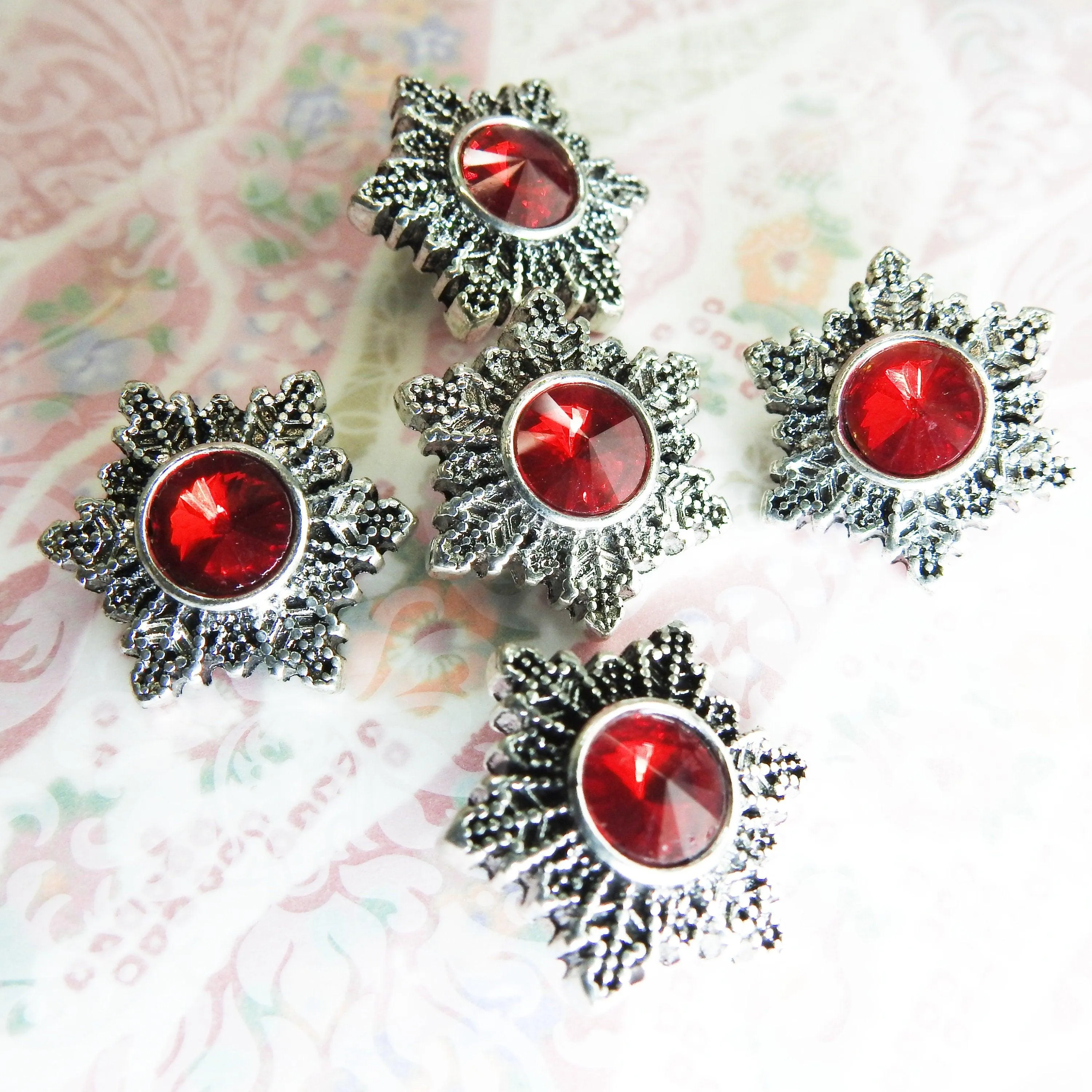 Red snowflake snap buttons