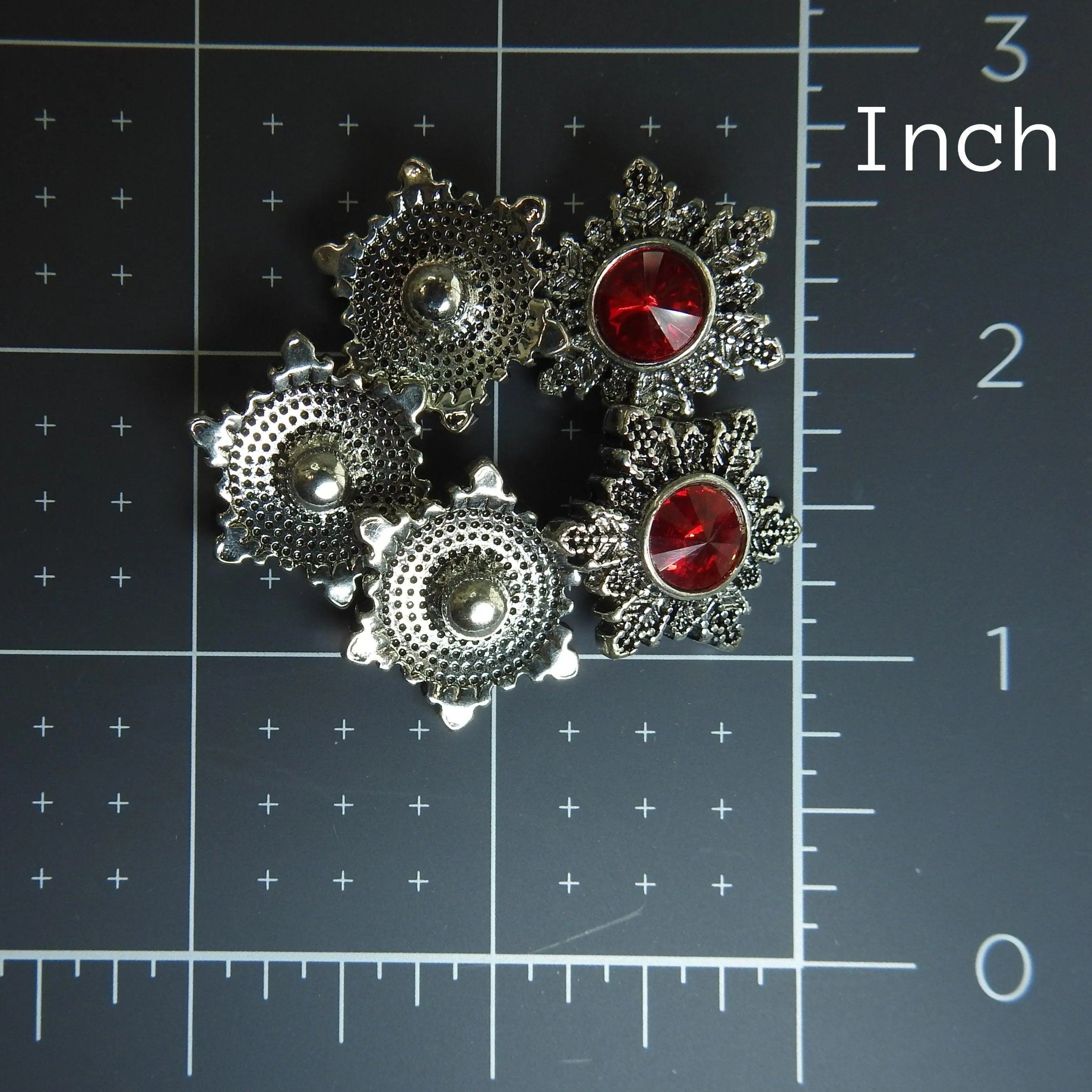 Red snowflake snap buttons