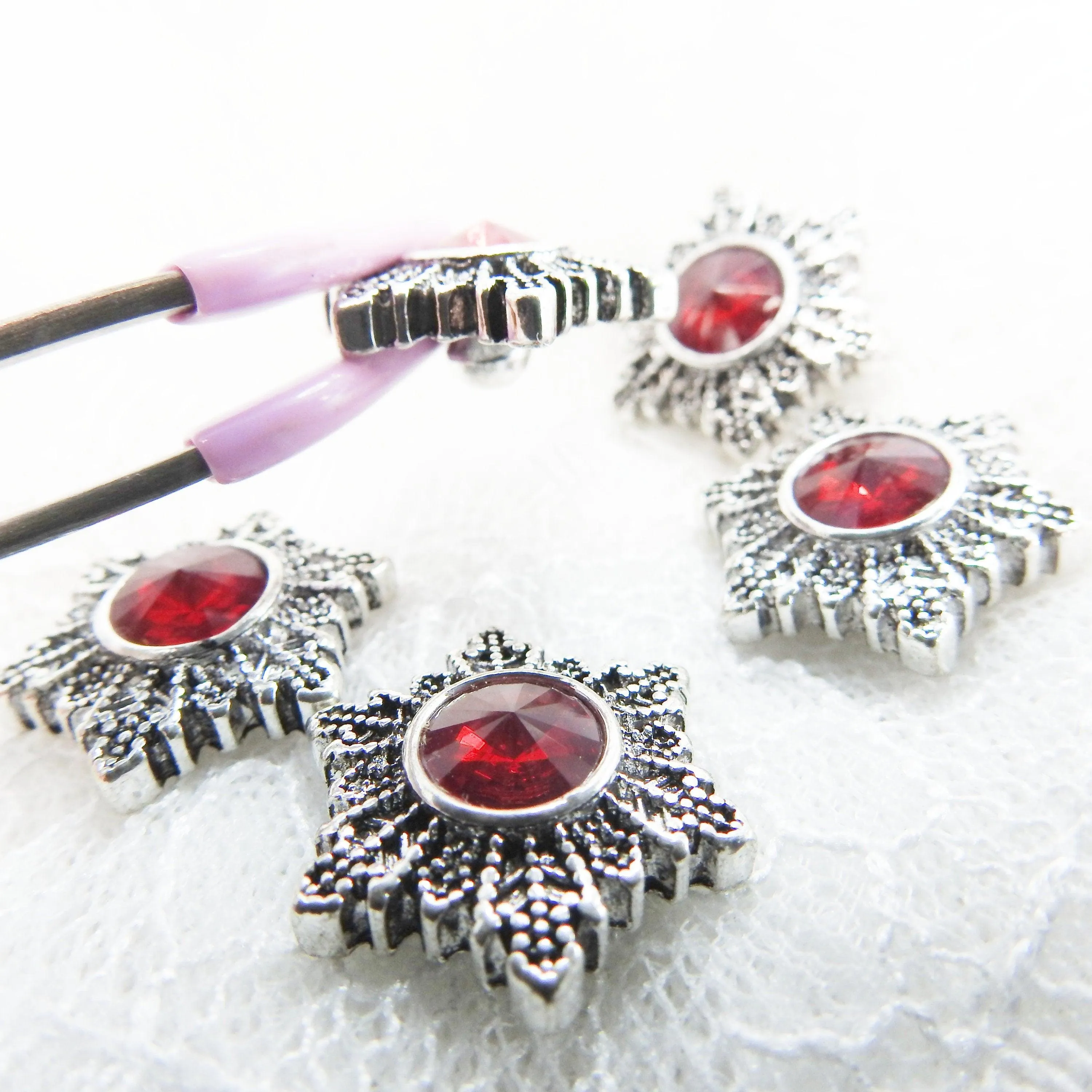 Red snowflake snap buttons